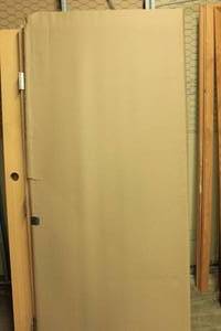 lot 63 image: Solid Core Wooden Door Blank, Still in Cardboard
