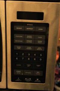 lot 87 image: Used Whirlpool EZ-Choice 1000 Watt Microwave 30x15x16 - Tested and Working, See Pictures