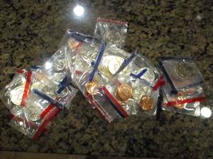 Lot of (43) US Mint Set (P &D) Dollar Coins, Quarters , Dimes and Pennies from 85, 87-89, 99, 00, and 02 in Original Cello