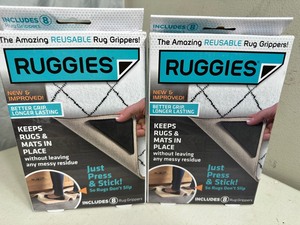 2 New Sets of Ruggies Rug Grippers