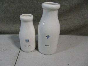 lot 21 image: 2 JunkMarket Decorative Milk Jugs