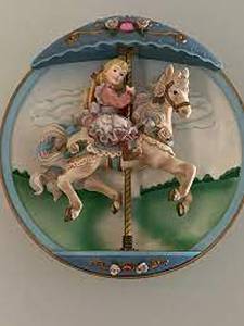 lot 45 image: 1994 The Bradford Exchange Carousel Day Dreams Swept Away Wind Up Musical Collector Plate