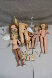 lot 129 image: Somewhat Creepy Lot of Dolls Doll Parts and Doll Stands