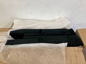 lot 145 image: Black Tufted Couch