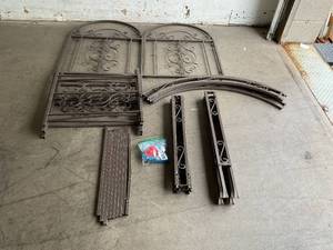 lot 134 image: Plow & Hearth Montebello Scrollwork Gunmetal powder-coat finish Metal Garden Arbor with Gate