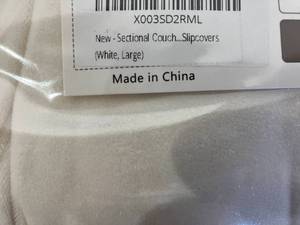 lot 334 image: White 2-Piece Sectional Couch Cover