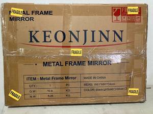 lot 447 image: Keonjinn 24 x 36 Inch Rectangular Black Framed Wall Mirror