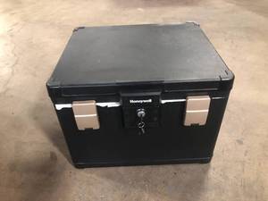 lot 50 image: 1.06 cu. ft. Molded Fire Resistant and Waterproof Legal Document Storage Chest with Key and Double Latch Lock by Honeywell Customer Returns See Pictures