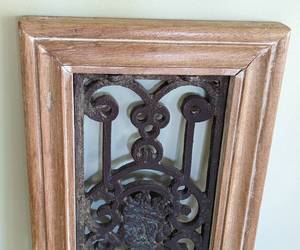 lot 210 image: Cast Iron and Wood Wall Hanging