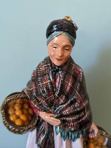 lot 211 image: Royal Doulton The Orange Lady Porcelain Figurine
