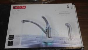 lot 683 image: Delta Kitchen Faucet.
