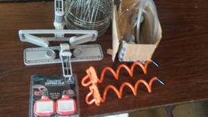 lot 701 image: Misc. Hardware. 12-inch vortex anchors, paper towel clips and more.