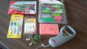 lot 716 image: New fishing lures and Rapala scale.