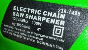 lot 719 image: Electric Chainsaw Sharpener.