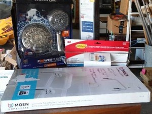 lot 985 image: Waterpik Showerhead and more.