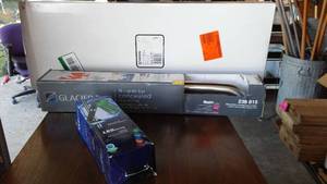 lot 986 image: LED Showerhead, Grab Bar, and Stainless Shelf.