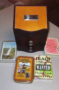 lot 788 image: Playing Card Holder and (4) decks of cards.