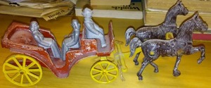 lot 820 image: Vintage Antique Cast Iron Horse, Buggy and Passengers.