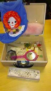 lot 858 image: Vintage child suitcase with contents.
