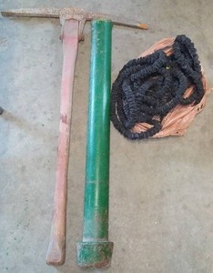 lot 881 image: Pic Axe, Post Driver, Hose.