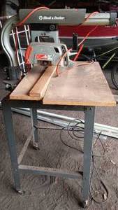 lot 97 image: Black and Decker Radial Arm Saw with Stand.