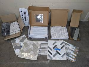lot 30 image: Assortment of (2) Fired Earth Glass Works Glass Shelves and (38) Allen  Roth, Ceremonial Festive Whites Mosaic, Premium Mosaics and Other Tiles
