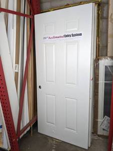 lot 143 image: Assortment of (7) Previously Installed Doors in Various Sizes
