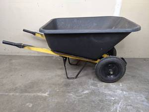 lot 68 image: Black Truper Two Wheeled Wheelbarrow