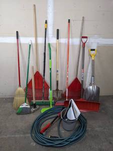 lot 86 image: A Variety of Cleaning Tools Including Rakes, Garden Hose, Snow Shovel and More