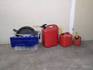 lot 88 image: Gas Cans, Funnels, Oil Pan and More