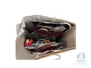 lot 25 image: Variety of Gift Wrap Supplies, Mostly Christmas Wrapping Paper and Gift Bags