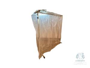 lot 70 image: Portable Clothing Storage Rack with Plastic Enclosure