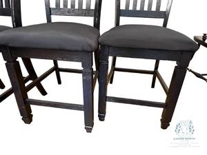 lot 188 image: Four Black Upholstered Barstools 24 at the Seat