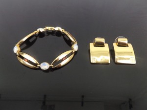 lot 75 image: Vintage Givenchy 7 Bracelet and Post Earrings Set