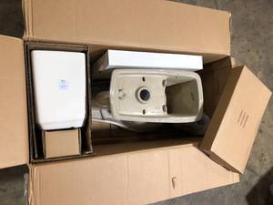 lot 8 image: Glacier Bay 2-piece 1.0 GPF1.28 GPF High Efficiency Dual Flush Elongated Toilet in Biscuit, Seat Included  Customer Returns See Pictures