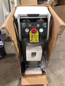 lot 19 image: Husky 20 Gal. Vertical Electric-Powered Silent Air Compressor Missing some Parts not rum Customer Returns See Pictures