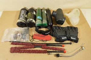lot 28 image: Assorted Paintball Gear - Tanks, Gloves, Cleaning