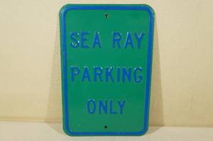 lot 79 image: Metal Sea Ray Parking Only Sign