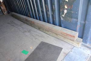 lot 703 image: 2 12 Foot Long 6 x 6 Wood Posts