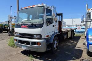 lot 1 image: 2002 GMC T6500 Flat Bed Truck - 137,382 Miles
