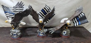 lot 33 image: Three Bradford Exchange Thin Blue Line Eagles