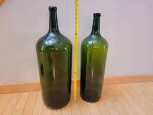 lot 60 image: Oversized Decor Wine Bottles