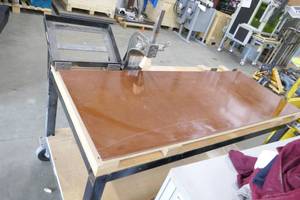 lot 7 image: Work Table with Dayton 1 Ton Arbor Press
