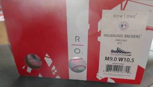 lot 15 image: New tennis shoes could be Milwaukee or could be Minnesota