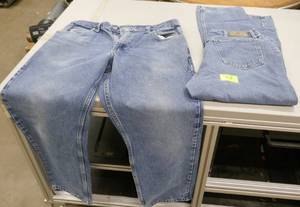 lot 57 image: 2 pair Wrangler relaxed jeans 36x32