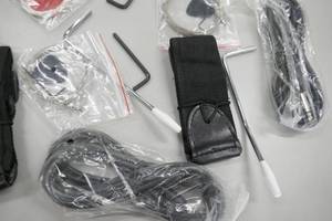 lot 100 image: Electric guitar strings, picks, straps, plugs