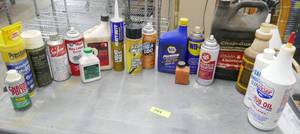 lot 149 image: Sea Foam, De-icer, Liquid Nails, oil, chain lube etc