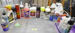 lot 153 image: Armor all, WD40, caulk, De-icer, grease, cleaner, paint etc