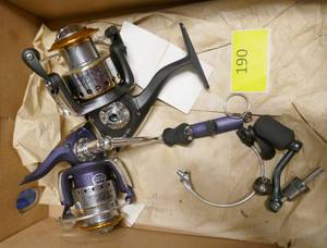 lot 190 image: 2 new fishing reels for repair, the stem is broke on one and the other is missing the crank