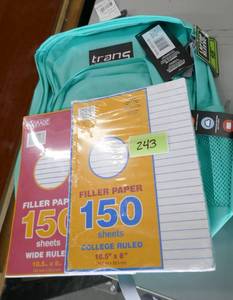 lot 243 image: New school backpack and 2 packs of paper